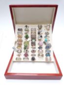 Forty two silver rings set with topaz, black diamond, sapphire, diamonds, garnets, citrine, peridot,