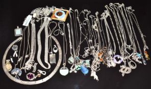 Thirty six silver pendants/ necklaces including abalone, quartz, amber, Greek key, mother of