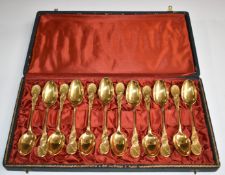 Cased set of twelve Christofle gold plated teaspoons, width of case 30cm