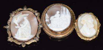 Three Victorian cameo brooches, largest 6 x 5cm