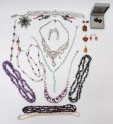 A collection of jewellery including amethyst necklace, diamanté necklace, Lalique earrings, silver