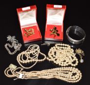 A collection of silver jewellery including bangle, bracelet, brooches, etc