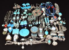 A collection of silver necklaces/ chains and pendants set with turquoise and faux turquoise