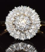 A 9ct gold ring set with diamonds in a cluster. 2.7g, size P