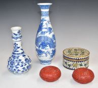 Chinese cloisonné covered circular casket, two covered cinnabar lacquer cache pots, porcelain guglet