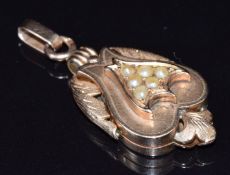 Victorian locket with foliate decoration set with seed pearls, 7.2g, 3cm