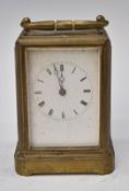 French 19thC brass cased repeating carriage clock striking on a bell, marked to the movement