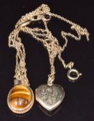 Two 9ct gold chains, 9ct gold locket and a tiger's eye pendant, 45cm long, 11.4g