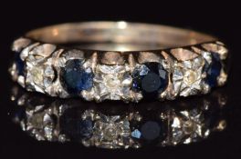 A 9ct gold ring set with sapphires and diamonds, 1.8g, size L