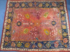 A large vintage wool rug, possibly Ushak, 352 x 291cm