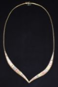A 9ct gold tri-coloured necklace with textured links, 9.9g, 40cm long