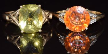 Two 9ct gold rings set with citrine and one with quartz and diamonds, 7g, size T