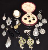 A 9ct gold brooch set with faux cameo, boxed studs, earrings including silver and peridot, jet,