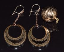 A pair of Victorian inlaid tortoiseshell earrings and a yellow metal pendant