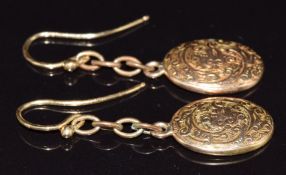 A pair of 18ct gold earrings converted from cufflinks, 2.8g