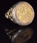 A 9ct gold ring set with a 1906 gold half sovereign, 11.3g, size Q
