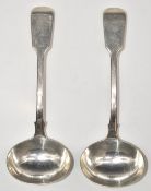 Pair of Victorian hallmarked silver fiddle pattern ladles, London 1854, maker H.J. Lias & son,