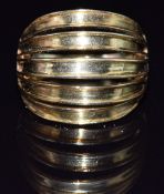 An 18ct gold multi-banded gold ring, 7.9g, size M