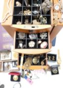 A collection of costume jewellery including Jewelcraft, vintage brooches, cultured pearls, coins