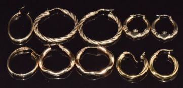 Four pairs of 9ct gold hoop earrings (6.4g) and a pair of silver gilt earrings