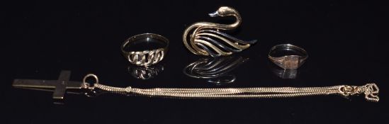 A 9ct gold cross, 9ct gold chain, 9ct gold swan brooch, 9ct gold signet ring and a 9ct gold knot