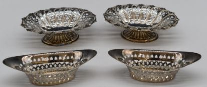 Two pairs of Victorian hallmarked silver bon bon dishes, one pair with pierced and embossed