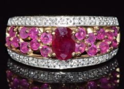 A 9ct gold ring set with rubies and diamonds, 3g, size N