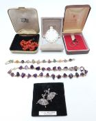 Mother of pearl Bethlehem pendant, silver ballerina brooch, two silver rings, amethyst necklace,