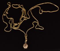 Victorian yellow metal guard chain and a Victorian mourning locket, 13.7g, 140cm long