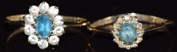 Two 9ct gold rings one set with topaz the other with topaz and diamonds, 2.7g, size R