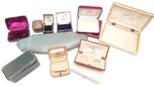 A collection of vintage jewellery boxes including 'Goldsmiths & Silversmiths Company', 'Parsons,