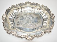 Peruvian or similar silver oval bowl with shaped scrolling border, marked sterling 925, length 28.