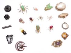 Nine Art Deco insect brooches, Victorian pinchbeck brooches, Victorian jet brooches, etc
