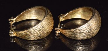 A pair of 9ct gold earrings with textured decoration, 8.9g