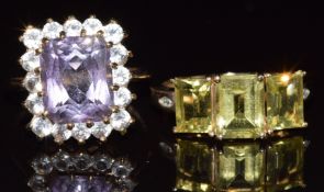Two 9ct gold rings, one set with peridot and diamonds and the other amethyst and zircon, 7.6g,