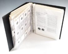 A collection of later Roman AE coinage contained in an album, well catalogued and documented