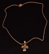 A 14k gold crucifix on a 14k gold chain, 6.5g, 51cm long