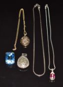 A 9ct gold locket and chain (8.1g), two silver necklaces, silver ring and silver pendant
