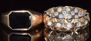 A 9ct gold signet ring set with onyx and 9ct gold eternity ring set with spinel, 8.8g, size P & M