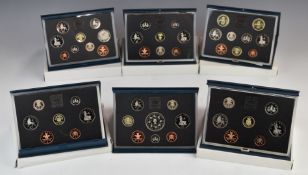 Six Royal Mint proof coin sets in deluxe cases, 1988-1993