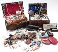 A collection of jewellery including Miracle brooch, beaded necklaces, enamel brooches, etc, in two