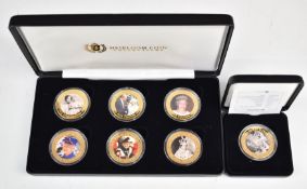 Heirloom Coins cased set of six commemorative gold plated photographic coins relating to HM The