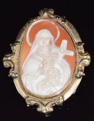A 9ct gold brooch set with a cameo depicting the Virgin Mary, 18.3g, 6 x 4.4cm