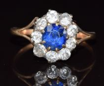 Victorian ring set with a cushion cut sapphire of approximately 1ct surrounded by old cut