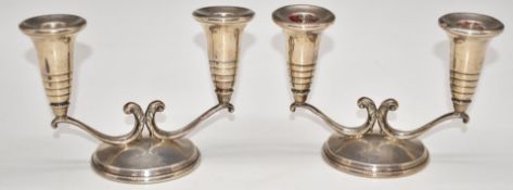 Pair of Elizabeth II hallmarked silver two branch candelabra, Birmingham 1957, maker Henry