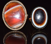 Victorian 9ct gold ring set with a banded agate cabochon (size H) and a 9ct gold ring set agate,