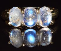 A 9ct gold ring set with three moonstone cabochons, 2.9g, size N