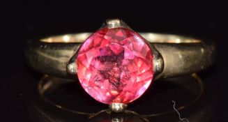 A 9ct gold ring set with a red topaz, 3.6g, size N