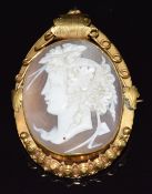 Victorian brooch set with a cameo depicting a young women, 10.6g, 3.4 x 4.4cm