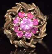 A 9ct gold ring set with rubies, 3.4g, size O